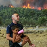 Blazes, soaring temperatures and violent storms strike across the world