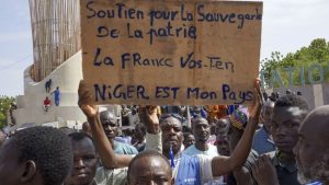 Europeans evacuated from Niger as neighboring West African juntas warn against intervention