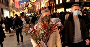 Heavy winter sweaters, coats pile up at stores as warm weather threatens holiday shopping season