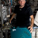 Astronaut Andreas Mogensen is pictured with a new exercise cycle