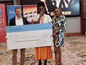 Emotional Rhodes Hall High student accepts inaugural Jill Stewart Sports Scholarship