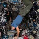 Astronaut Andreas Mogensen practices chest compressions, or CPR