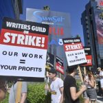 Screenwriters reach tentative deal with studios to end strike