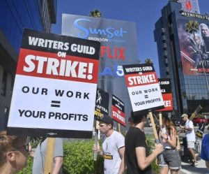 Screenwriters reach tentative deal with studios to end strike