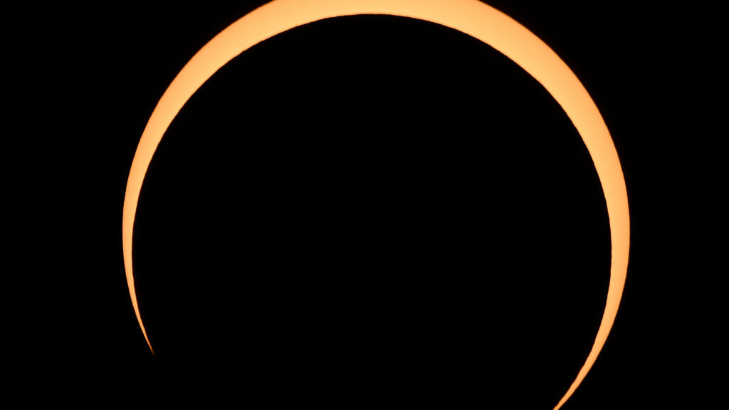 Skygazers watch ‘Ring of Fire’ eclipse over Western Hemisphere