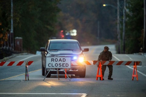 Massive manhunt for gunman after 18 killed in US