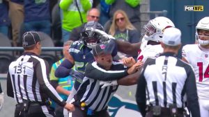 Cardinals OL Ejected From Game After Hitting Ref During Heated Exchange With Seahawks LB