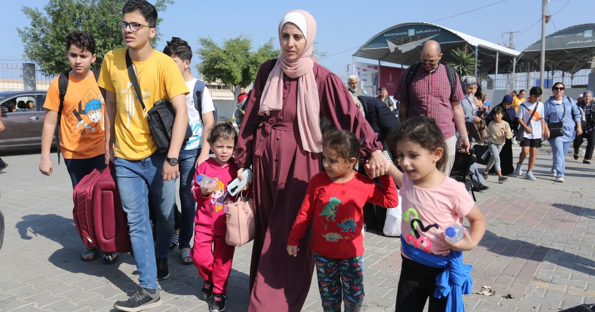 Confusion And Hope At Gaza’s Border With Egypt As First Foreign Passport Holders Depart