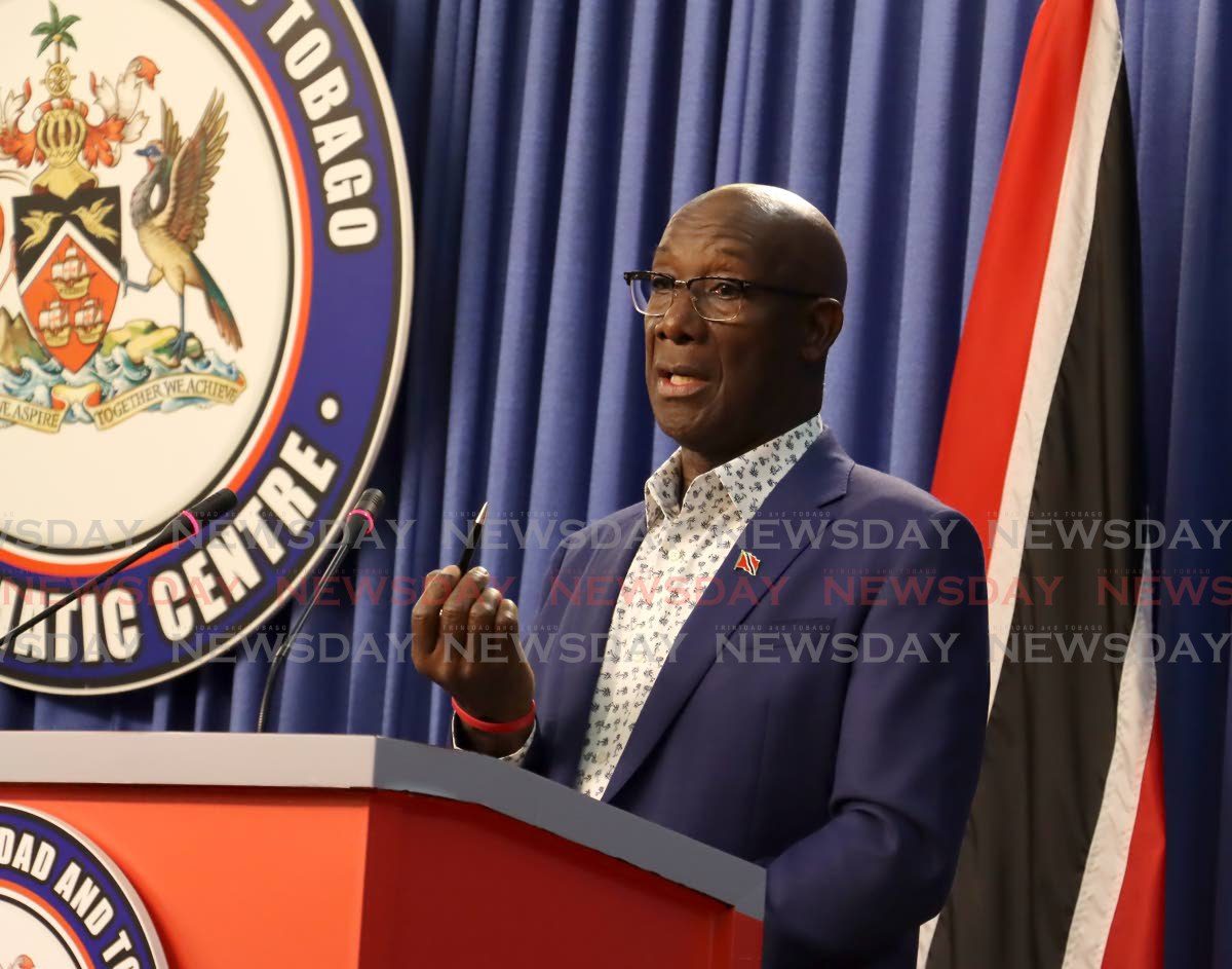 Rowley defends foreign travel against opposition critics