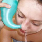 Gargling, rinsing nasal passages with saline solution may ease COVID-19 symptoms