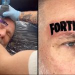 Dad gets a giant Fortnite tattoo on his forehead after losing a bet to his son