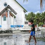 Australia to accept migrants from climate-hit Tuvalu in security pact