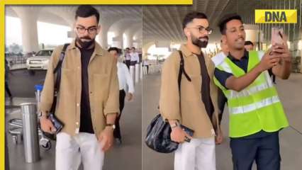 Watch: Virat Kohli leaves for South Africa to participate in 2-match Test series, poses for selfie with fan