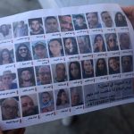 Israel drops leaflets on under-siege Palestinians asking for their help to find Israeli hostages, as Gaza death toll hits 25,000