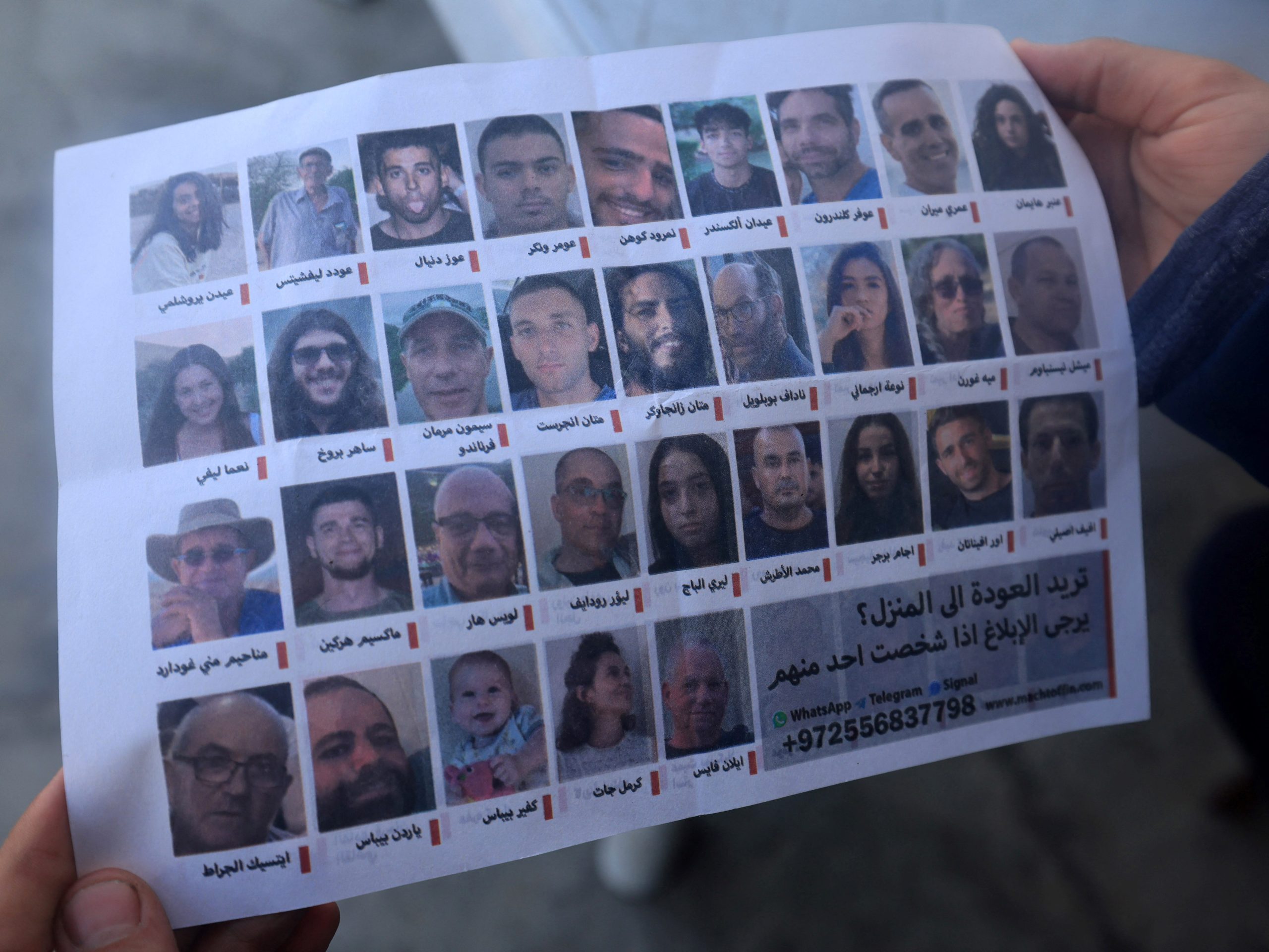 Israel drops leaflets on under-siege Palestinians asking for their help to find Israeli hostages, as Gaza death toll hits 25,000