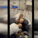 American Airlines traveler restrained by passengers, crew during meltdown before flight to US