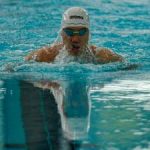 Swimmer Bryan betters his national 100m butterfly record in Doha