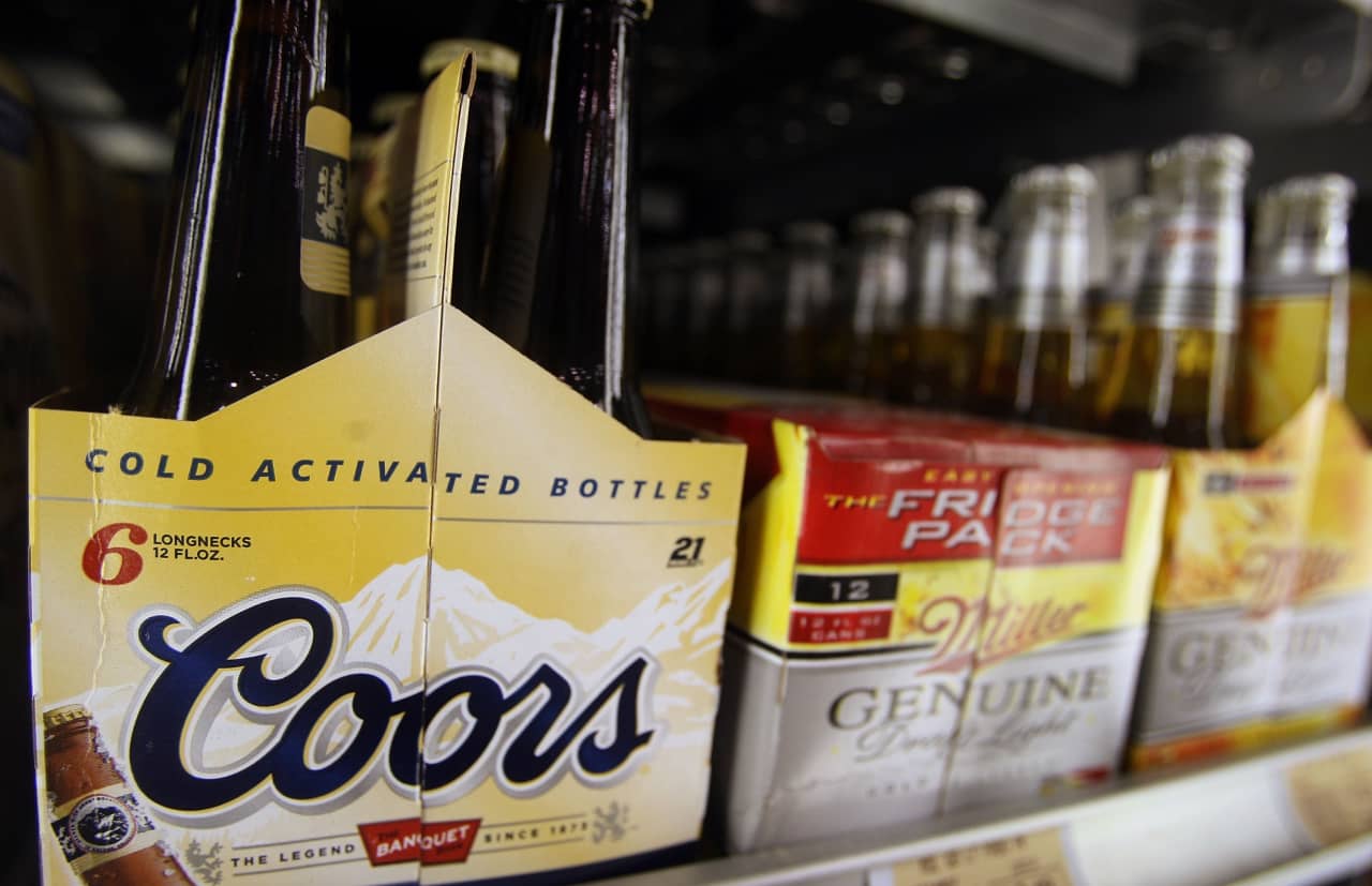 Molson Coors swings back to a quarterly profit, but stock still falls