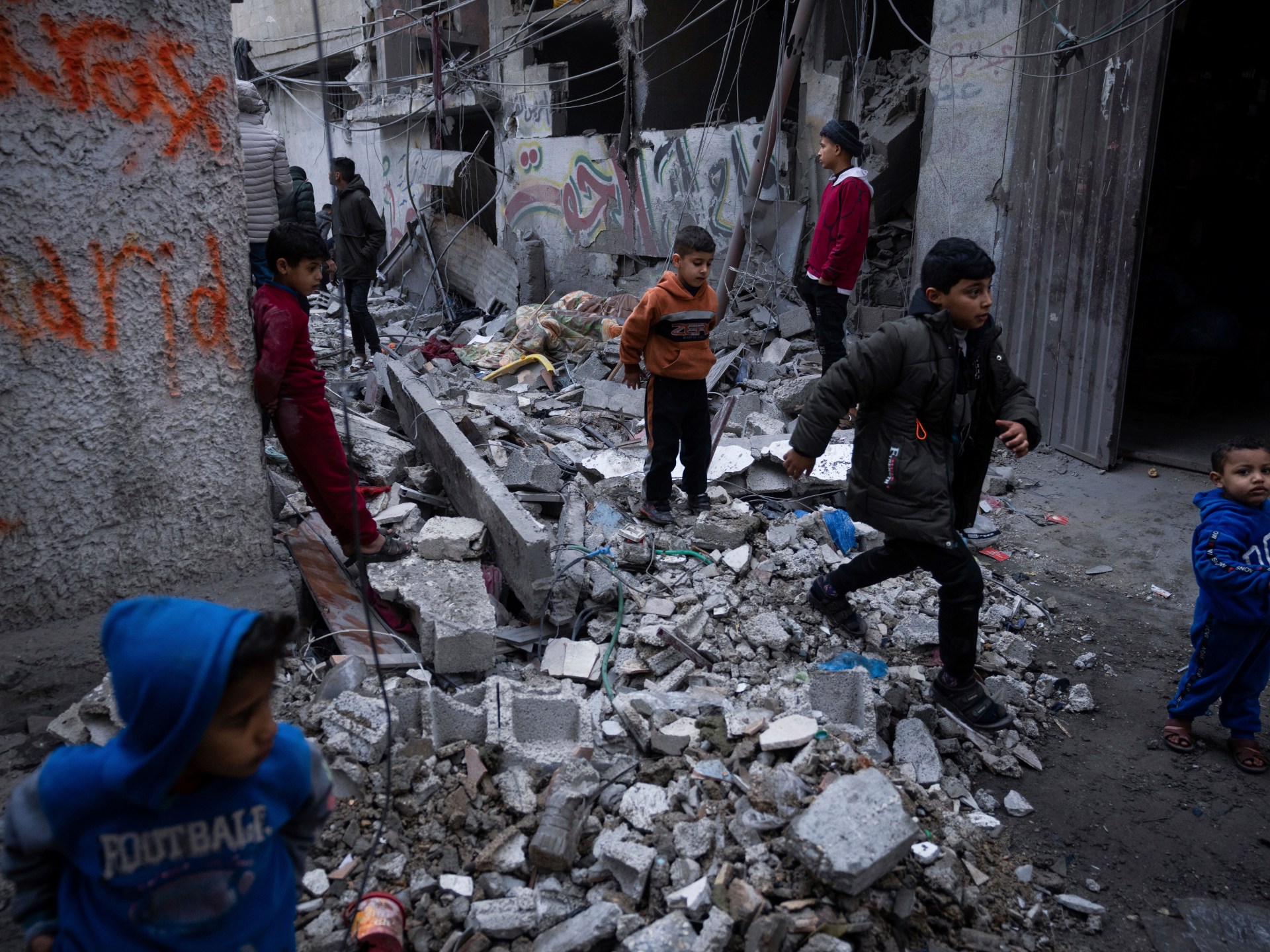 Gaza’s morning ritual: Searching under rubble for dolls, books, loved ones