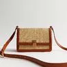 New Look just dropped a £25 version of Aspinal of London’s £550 raffia cross body bag