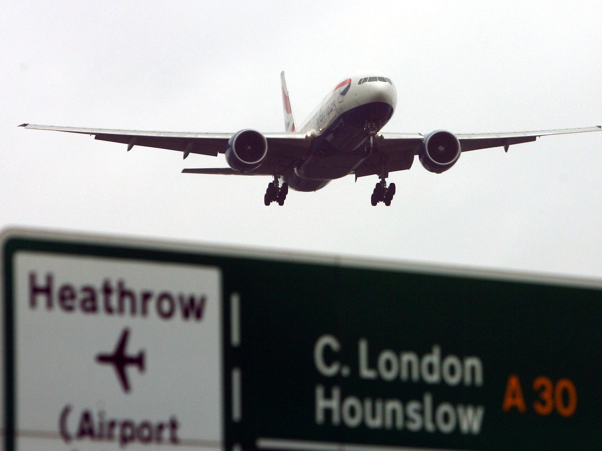 A baggage handler at a London airport is in critical condition after being dragged by conveyor belt, report says