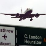 A baggage handler at a London airport is in critical condition after being dragged by conveyor belt, report says