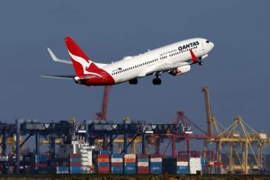 Qantas says profits down but reputation rebounding