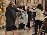 Protesters screaming ‘Free Palestine’ ambush Easter Vigil at St Patrick’s Cathedral as horrified worshippers watch flag-holding demonstrators get tackled out of NYC’s iconic church