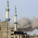 Israel bombs Gaza, fights Hamas around hospitals