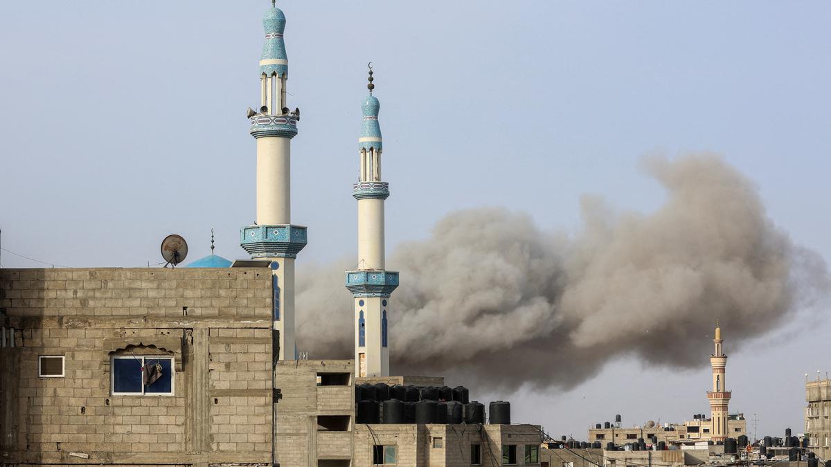 Israel bombs Gaza, fights Hamas around hospitals