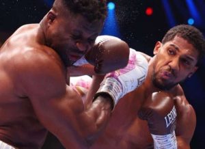 Anthony Joshua knocks out Francis Ngannou with devastating blow in round two