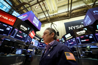 Nasdaq, S&P tumble as Netflix, chip stocks drag; AmEx boosts Dow