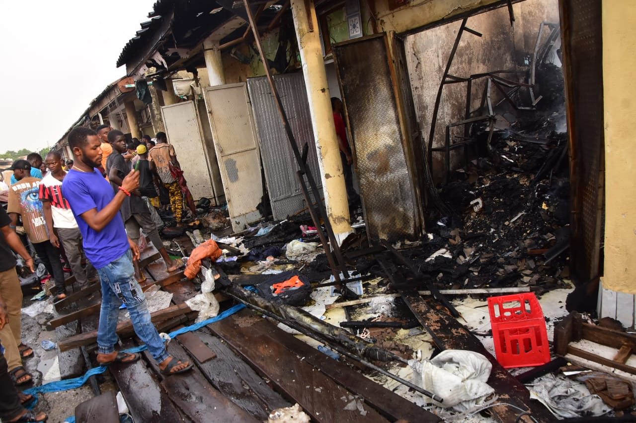 PHOTOS: Mob sets fire on Abuja market over suspect’s killing