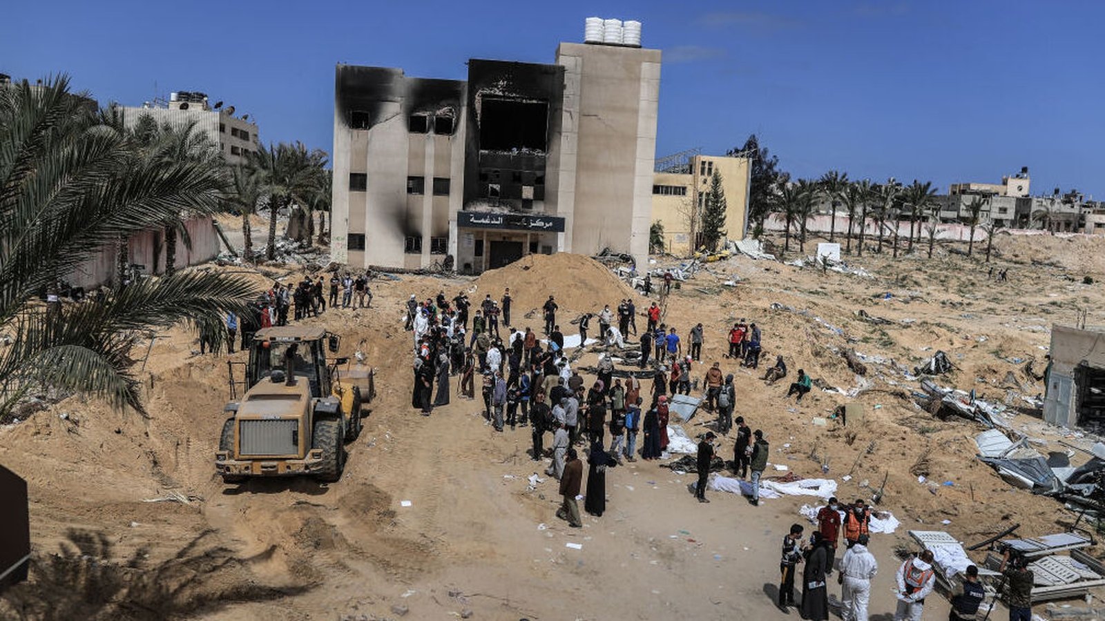 Dozens of bodies found buried at Gaza hospital