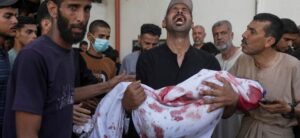 Dozens of Palestinians killed in Gaza in latest Israeli strikes, others near aid point