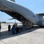 RAF airlifts first British nationals from Israel as’ shelter in place’ warning issued to those in Qatar as air space closed