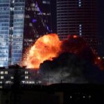Iran unleashes scores of ballistic missiles on Israel