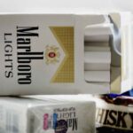 Philip Morris says black-market cigarettes are a big deal, as sales miss and stock falls