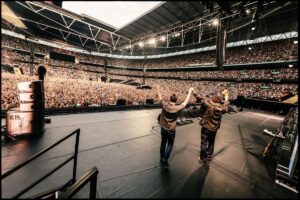 Oasis electrify Wembley as Gallagher brothers make triumphant return to London