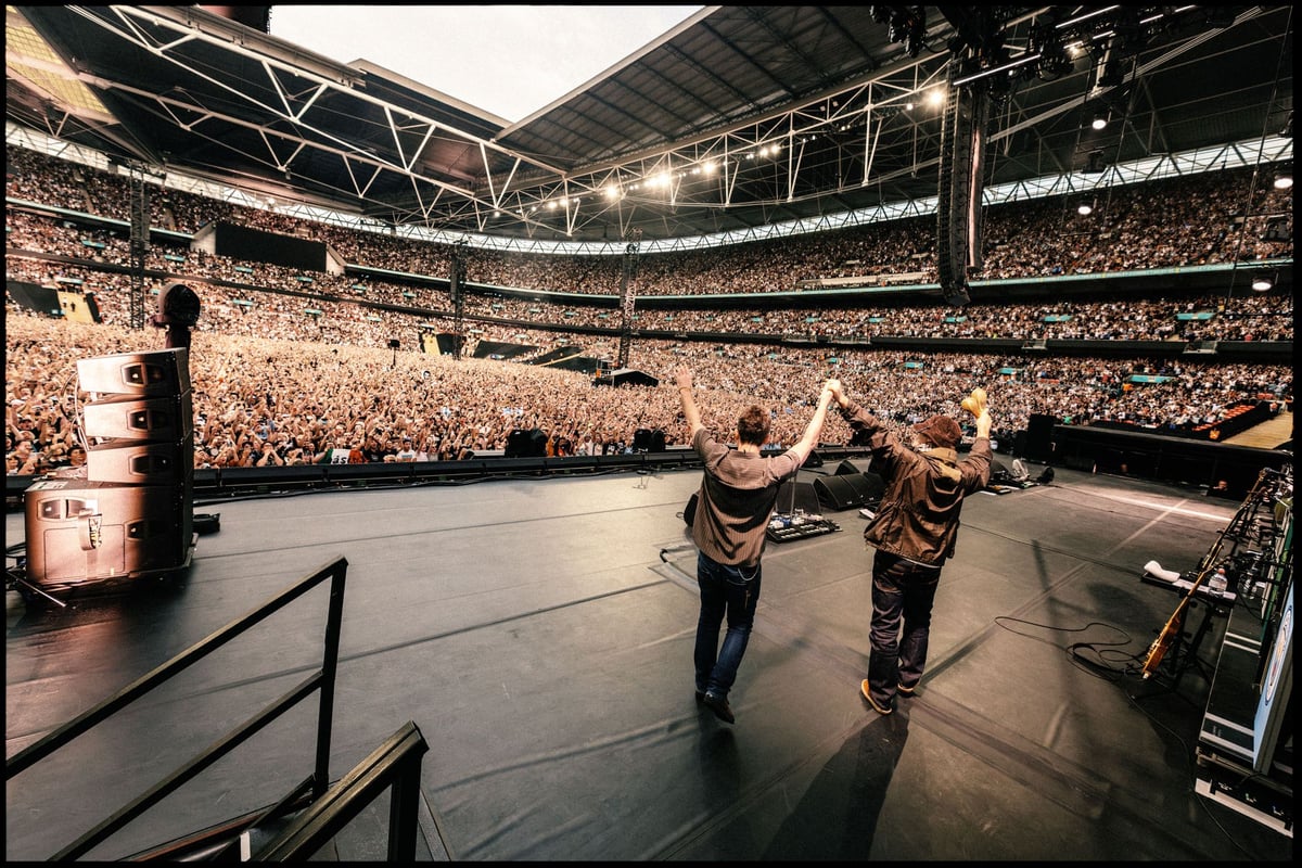 Oasis electrify Wembley as Gallagher brothers make triumphant return to London