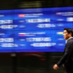 Stocks choppy as Fed leans hawkish, oil climbs on Mideast uncertainty