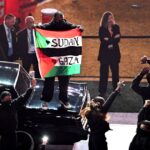 Super Bowl halftime performer charged for running on field with ‘Sudan and Free Gaza’ flag