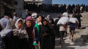 Gaza residents welcome rare organized aid delivery after months of chaos and hunger