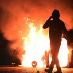 Yobs hurl petrol bombs, fireworks and bottles at cops in FIFTH night of riots as chaos spreads to new town