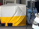 Man, 31, arrested on suspicion of murder after quadruple stabbing that killed two men at London business