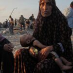 Israeli strikes in Gaza kill at least 33; famine announcement raises pressure