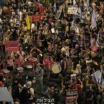 Israel prepares to move Palestinians to southern Gaza amid protest over war