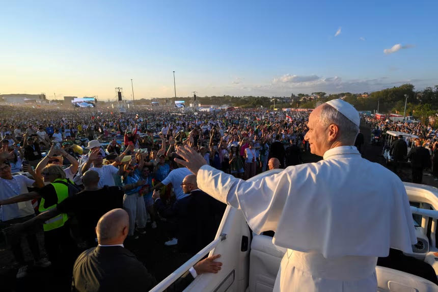 Faith, flags and deep-dish pizza: Pope Leo shows Gen Z appeal as a million young people flock to Rome