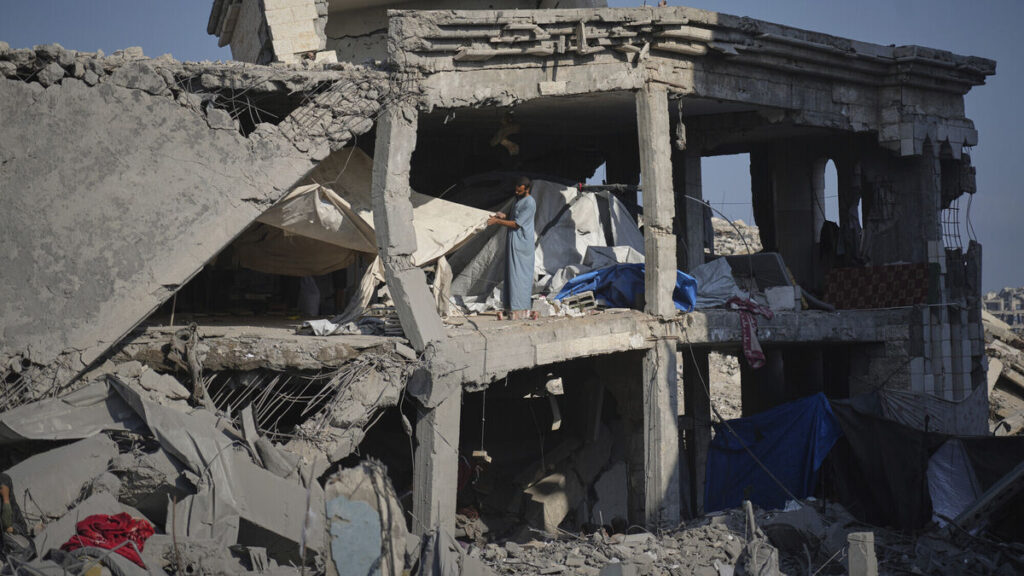 Dozens killed seeking aid in Gaza as Israel considers further military action