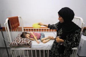 Gaza mother worries time running out for evacuation of malnourished daughter